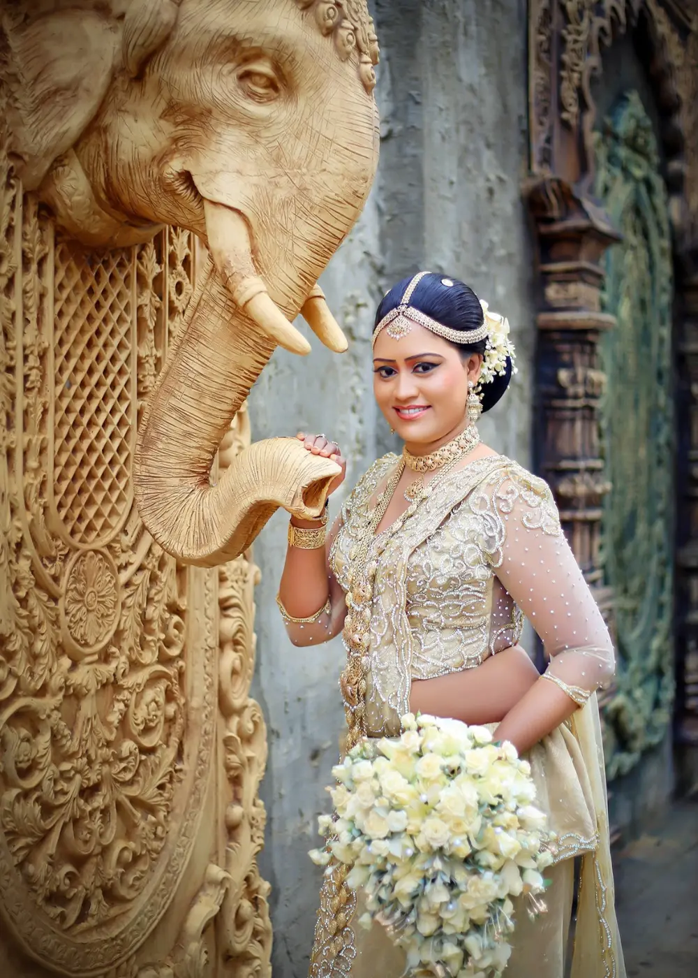 Bride and groom by the water